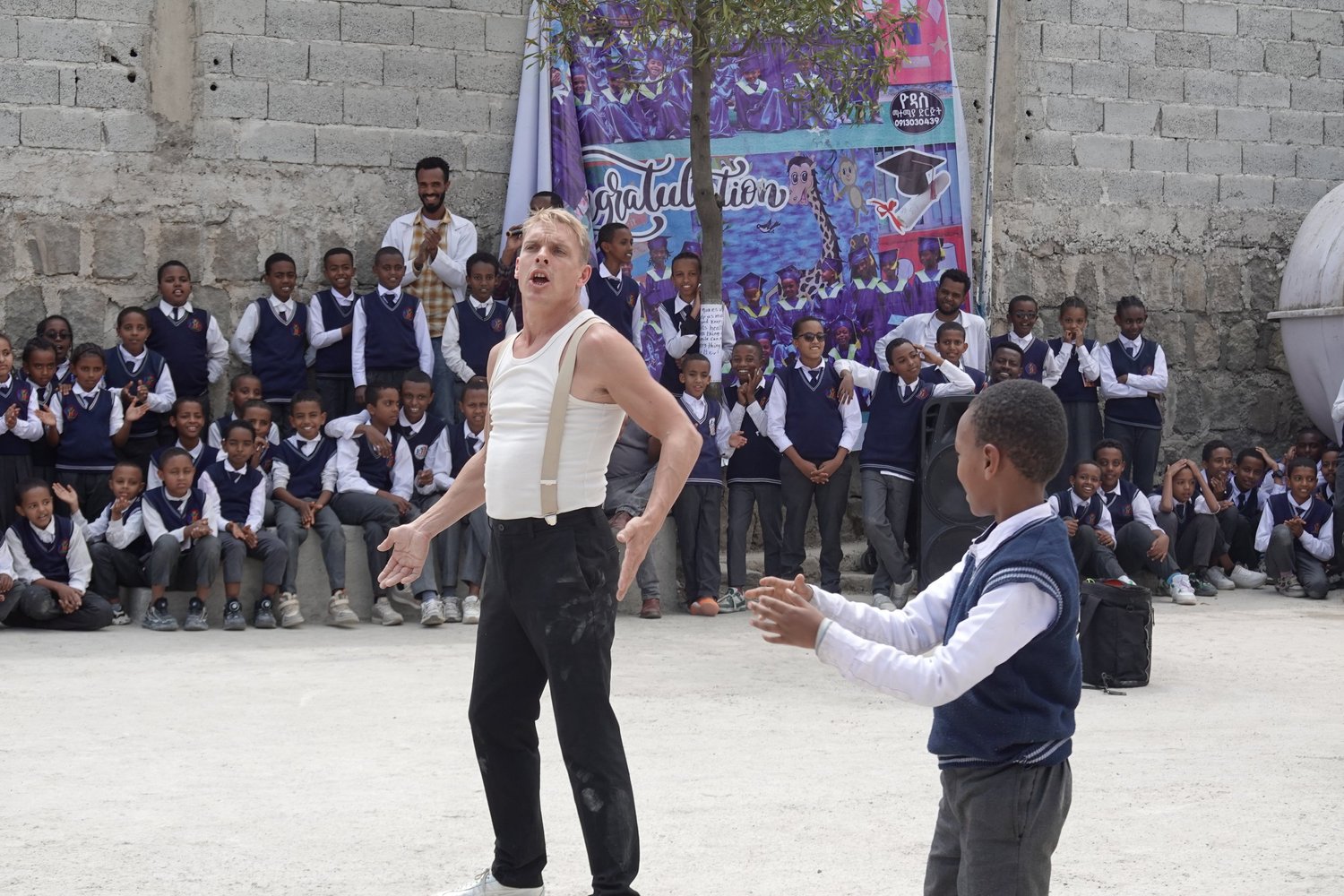 A live performance in a school courtyard